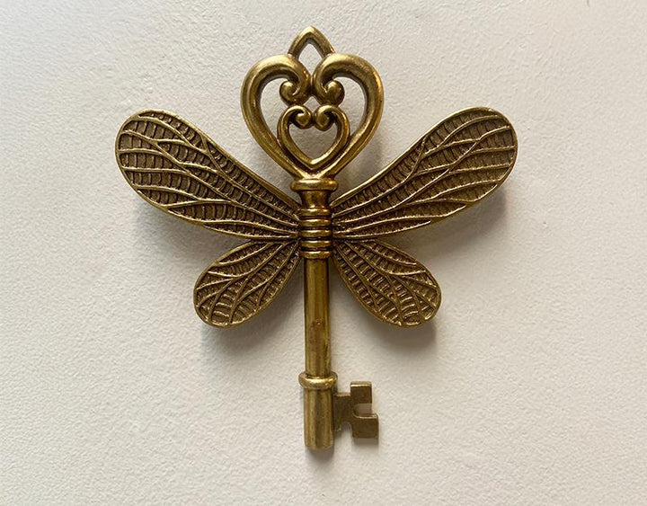 Photo n°2 du produit Déco murale clé ailes doré 16x17.3cm-481T17-0