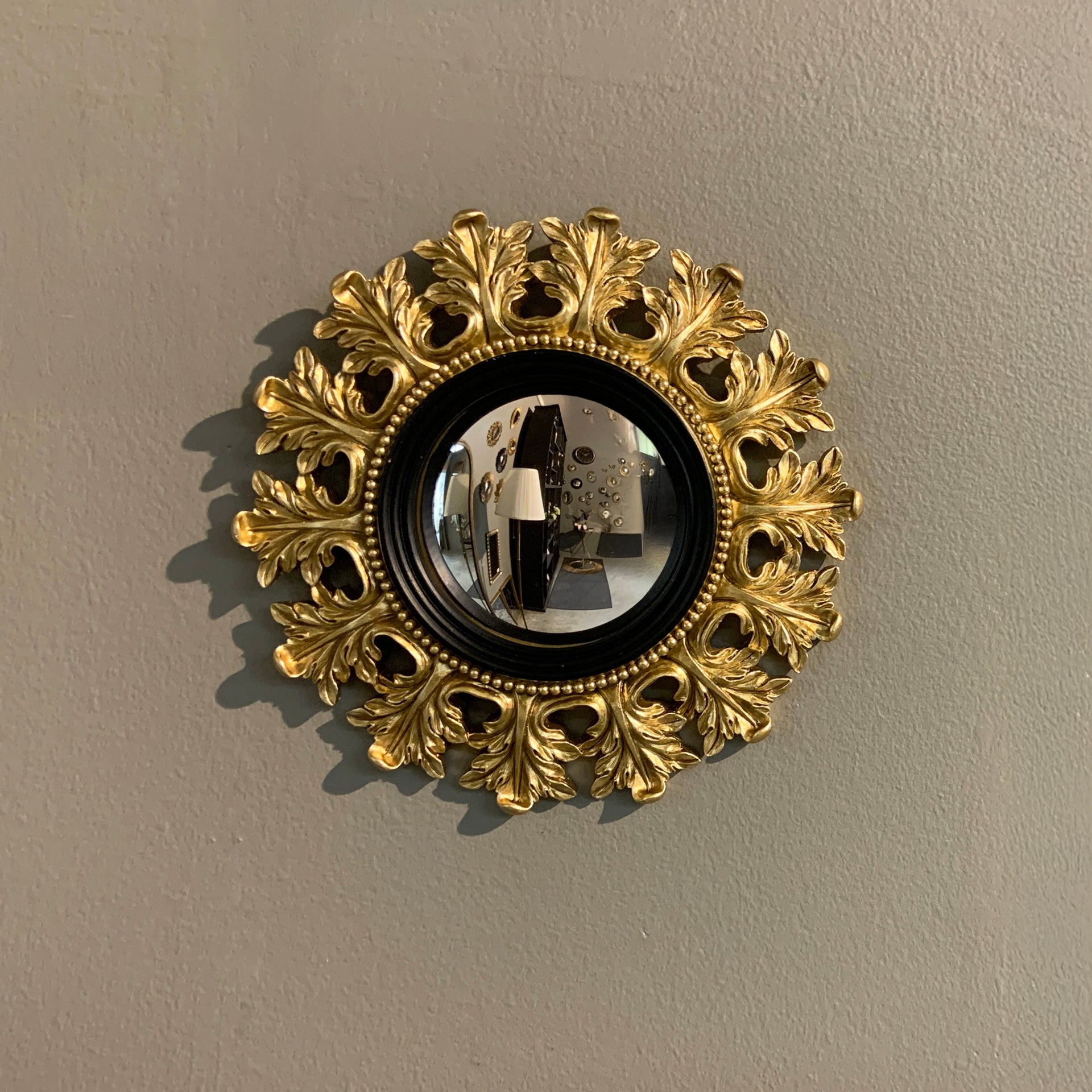 Miroir convexe noir et doré 20.5cm