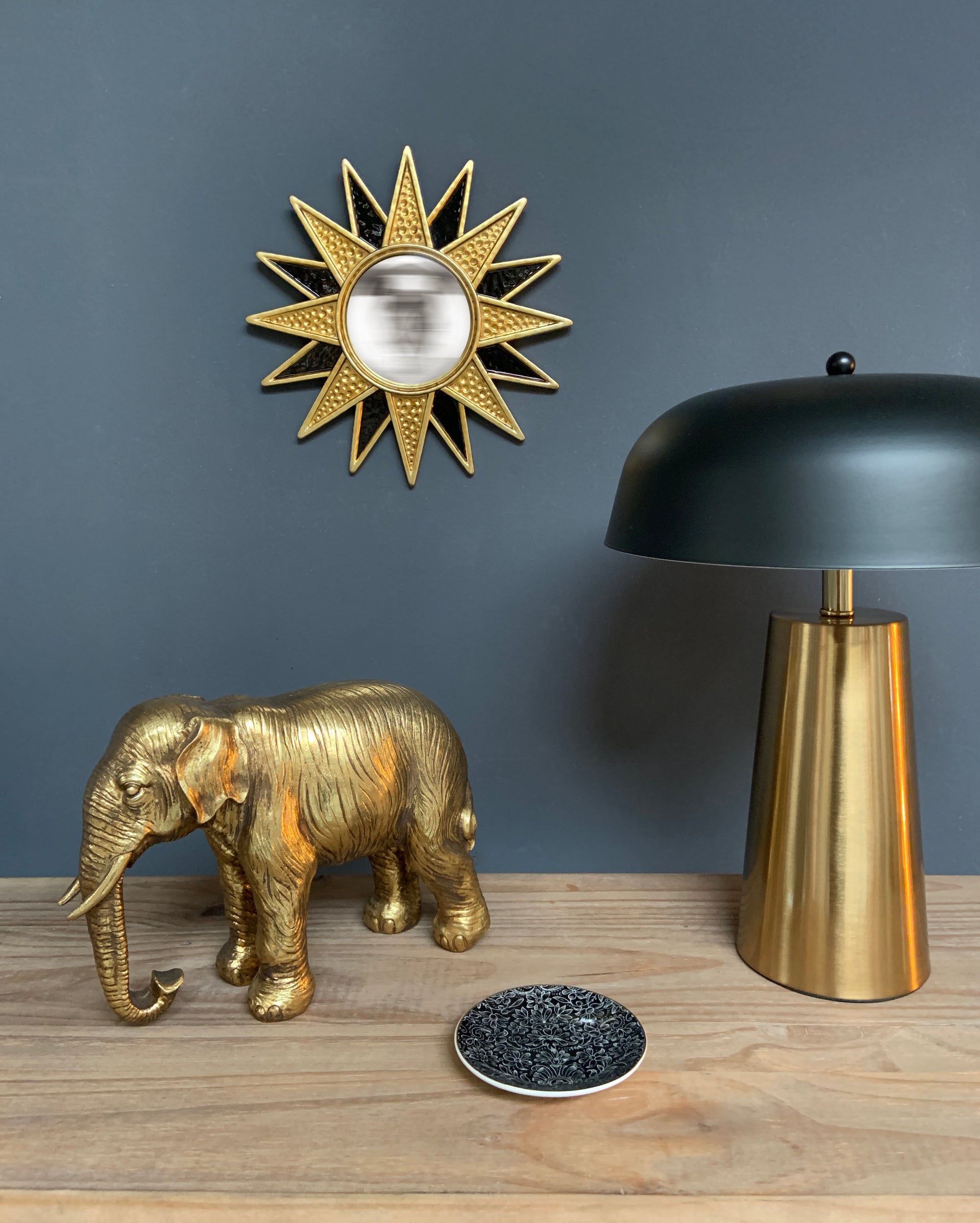 Miroir soleil convexe noir et doré 28cm