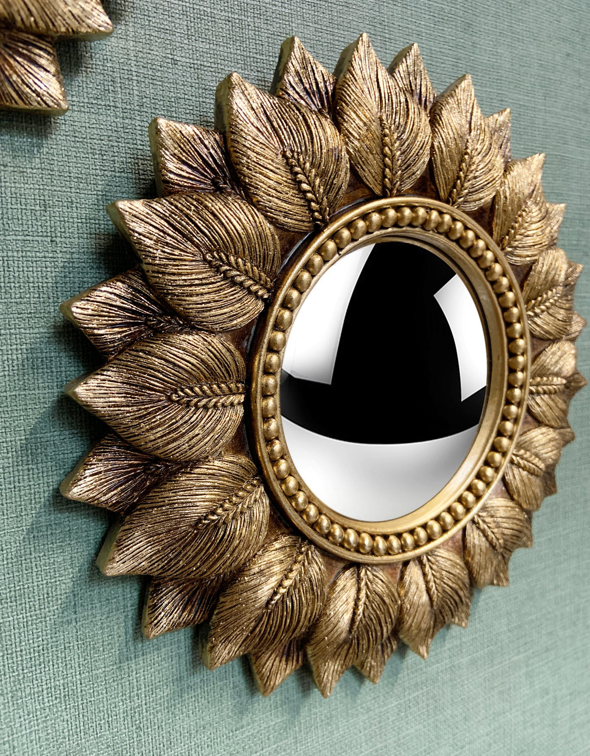 Miroir feuilles convexe doré 24.3cm